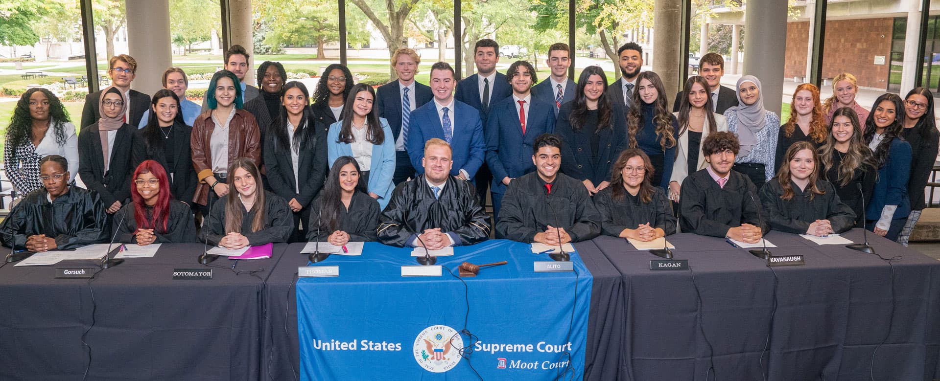 Students representing U.S. Supreme Court justices during a Moot Court simulation