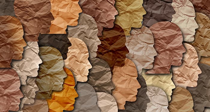 Illustrative image of african american faces using paper